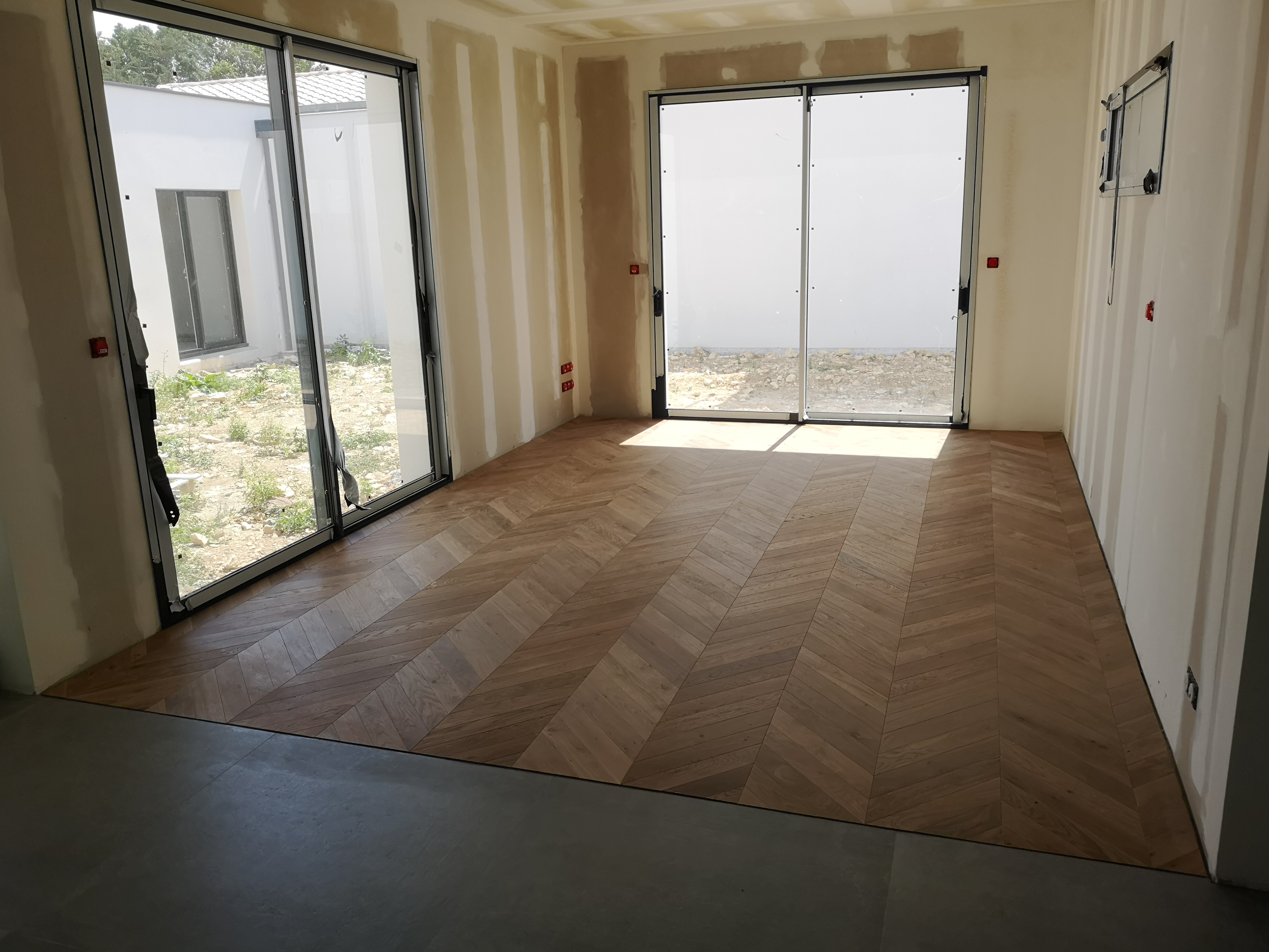 parquet collée sur sol chauffant