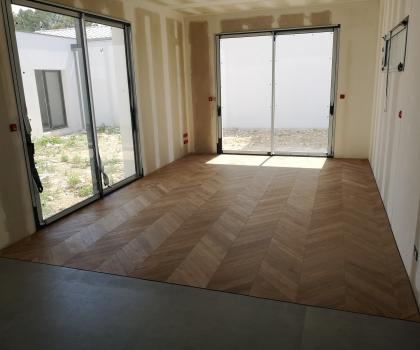 parquet collée sur sol chauffant